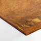 Hexagonal pedestal table or side table with a lattice structure and star pattern.