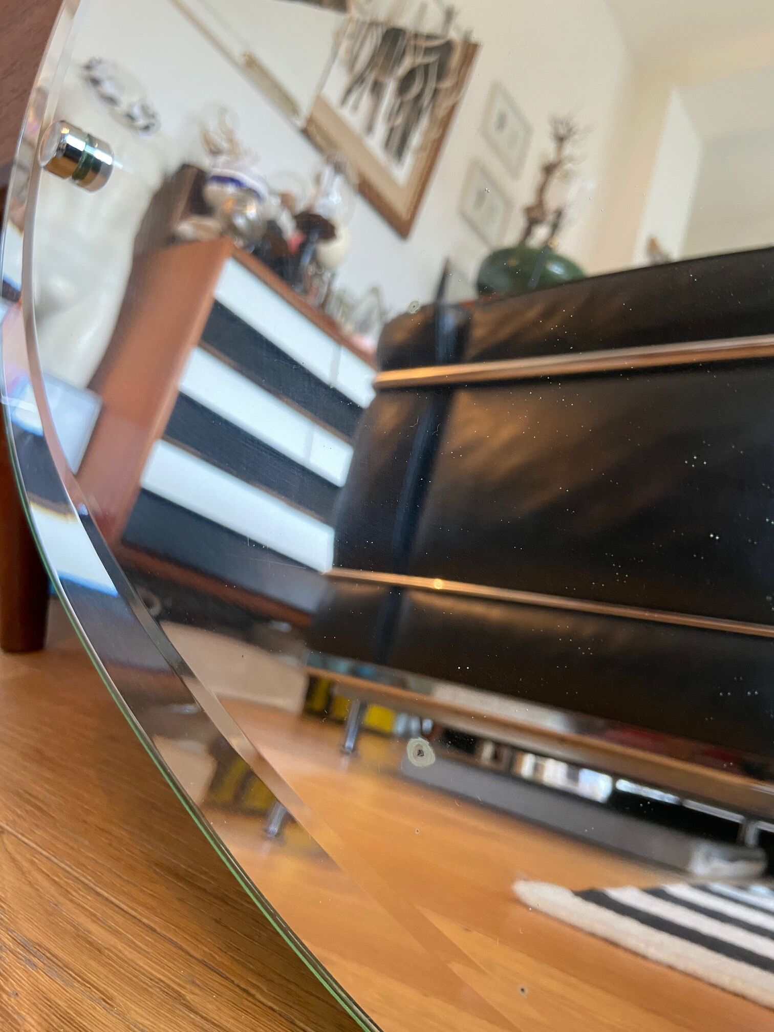 Bevelled oval mirror