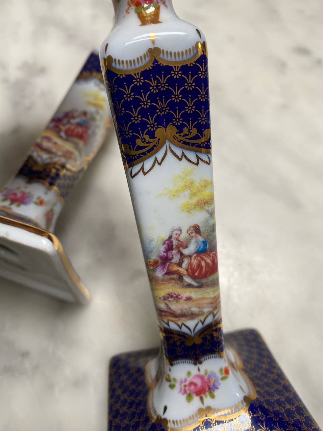 English porcelain clock and candle holders