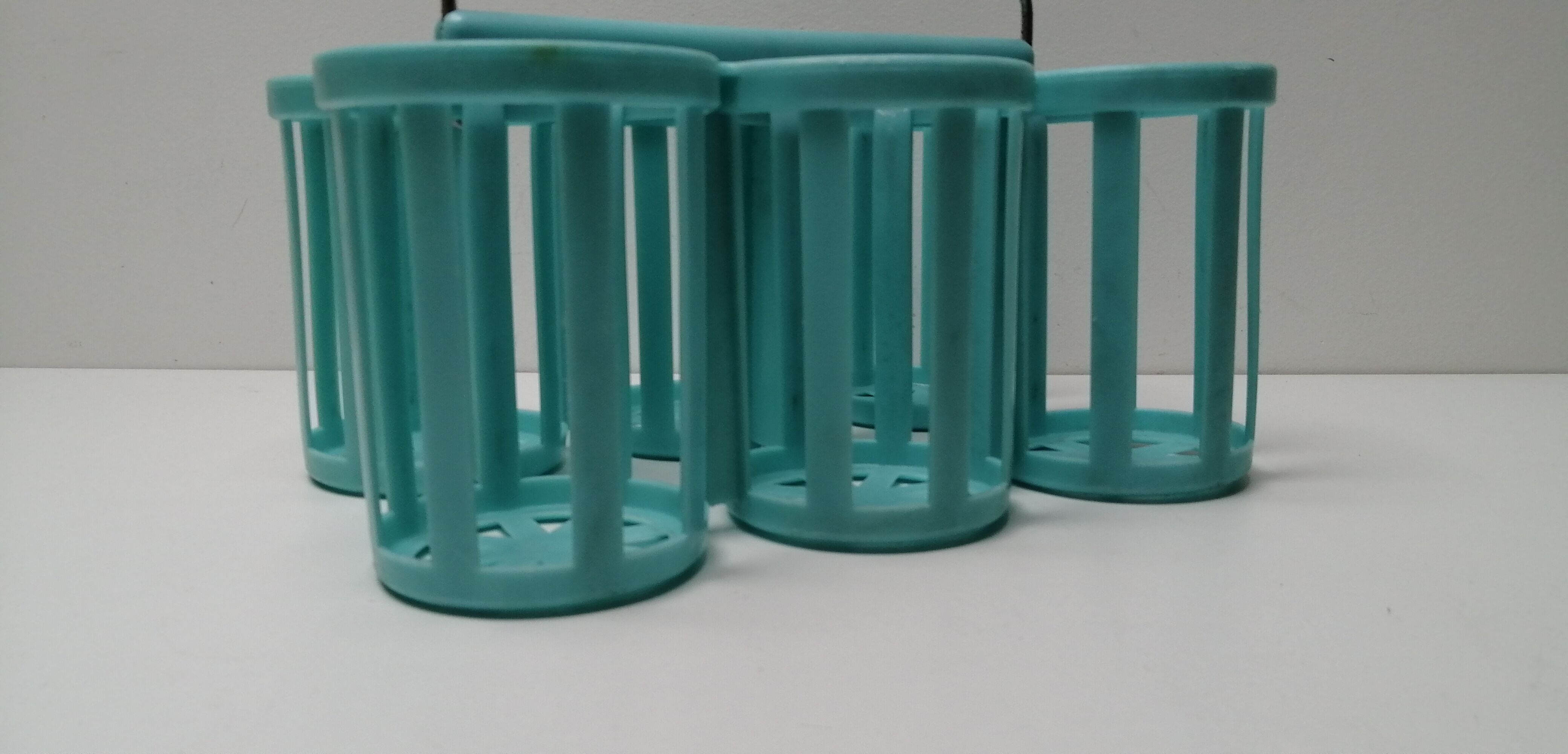 Vintage blue plastic bottle holder