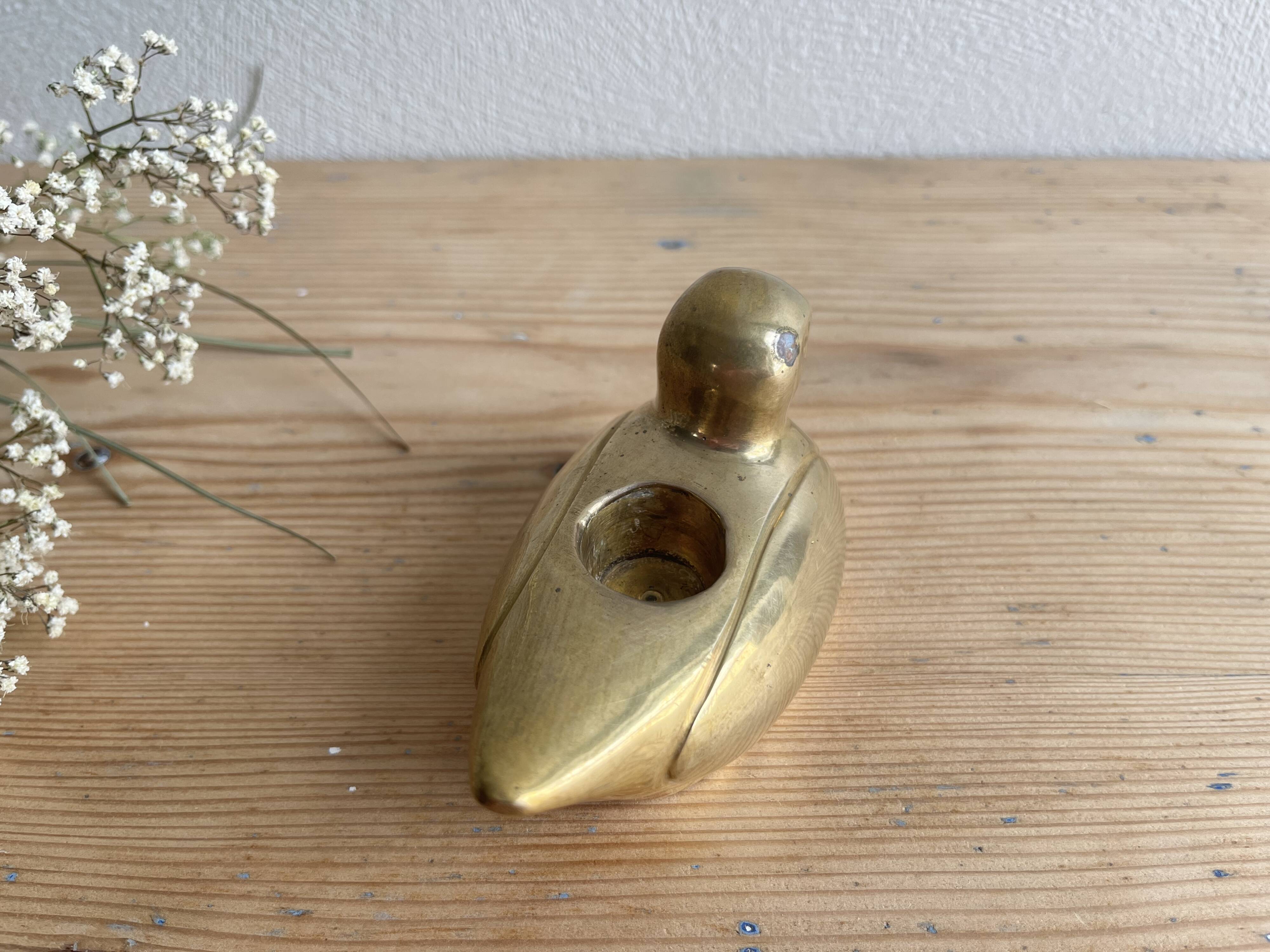 Brass duck candle holder