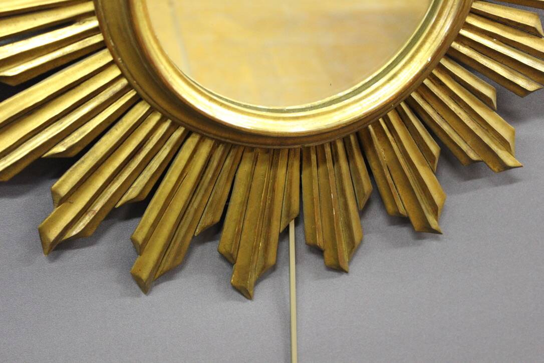 Sun mirror in gilded wood circa 1970