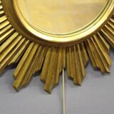 Sun mirror in gilded wood circa 1970