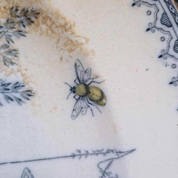 Assiette chauffante antique en ceramique et metal p et b pinder and bourne