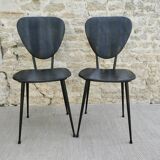 Pair of chairs with tapered metal legs and black Skaï, 60s