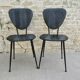 Paire de chaises avec pieds effilés en métal et Skaï noir, années 60