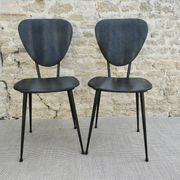 Pair of chairs with tapered metal legs and black Skaï, 60s