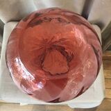 Vase form onion of pink color red