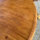 Round pine table with a diameter of 120 cm.