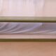 Old teak bench with original green patina.