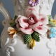 White dabbling vases with capodimonte porcelain floral decoration
