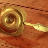 Old brass hand candle holder