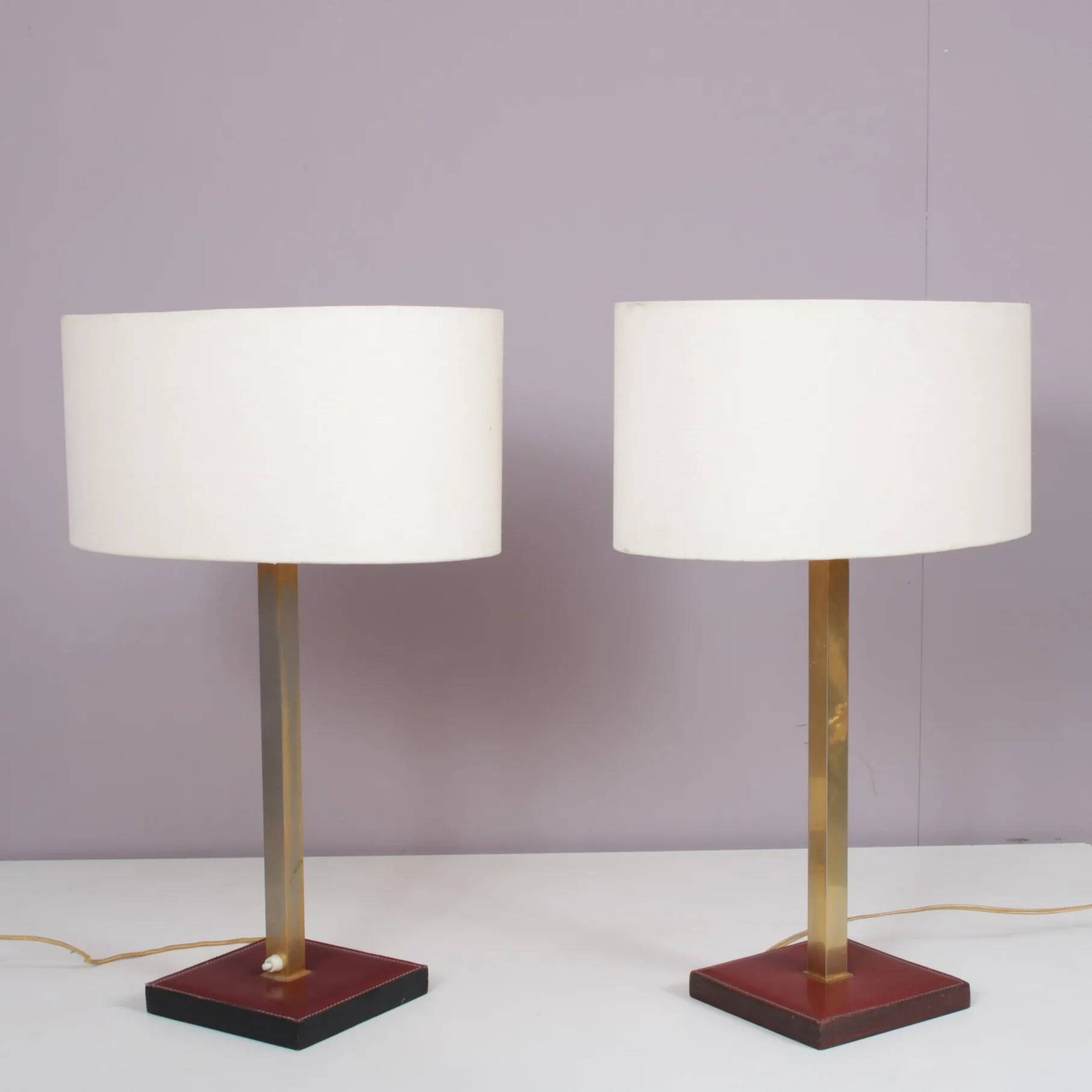 Pair of leather and brass table lamps from the 1960s, originating from Belgium.