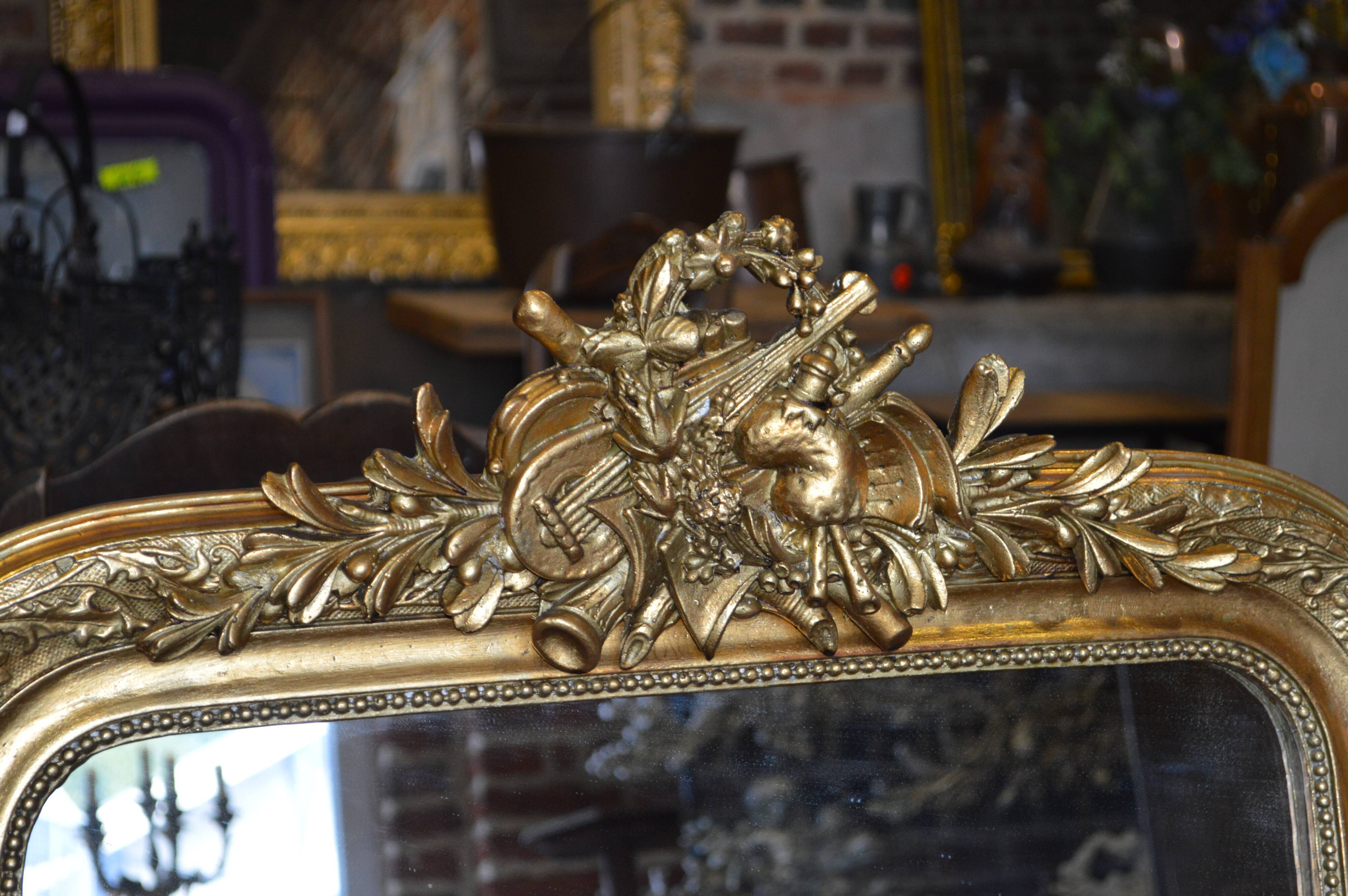 Louis Philippe style mirror with musical instruments
