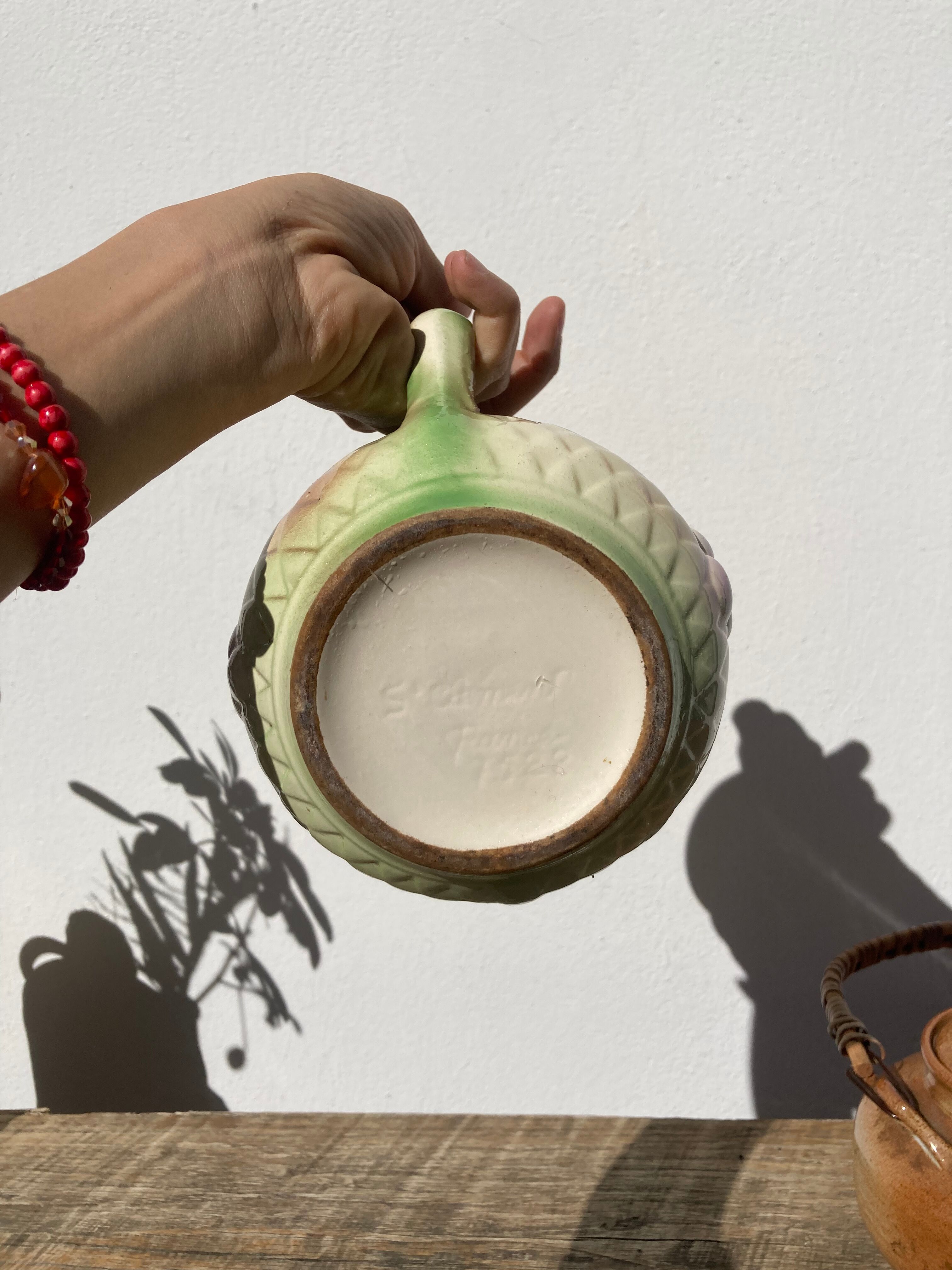 Pitcher in slip - earthenware Saint Clement numbered with fruit and grape basket decoration