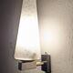 Modernist wall light in glass and brass by Maison Arlus, France circa 1950.