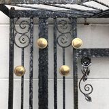Art deco wrought iron coat rack