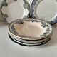 Set of 7 ironstone plates with floral friezes from the late 19th to early 20th century.