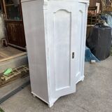 Vintage two-door wardrobe in painted white wood — late 19th century Hungarian style.