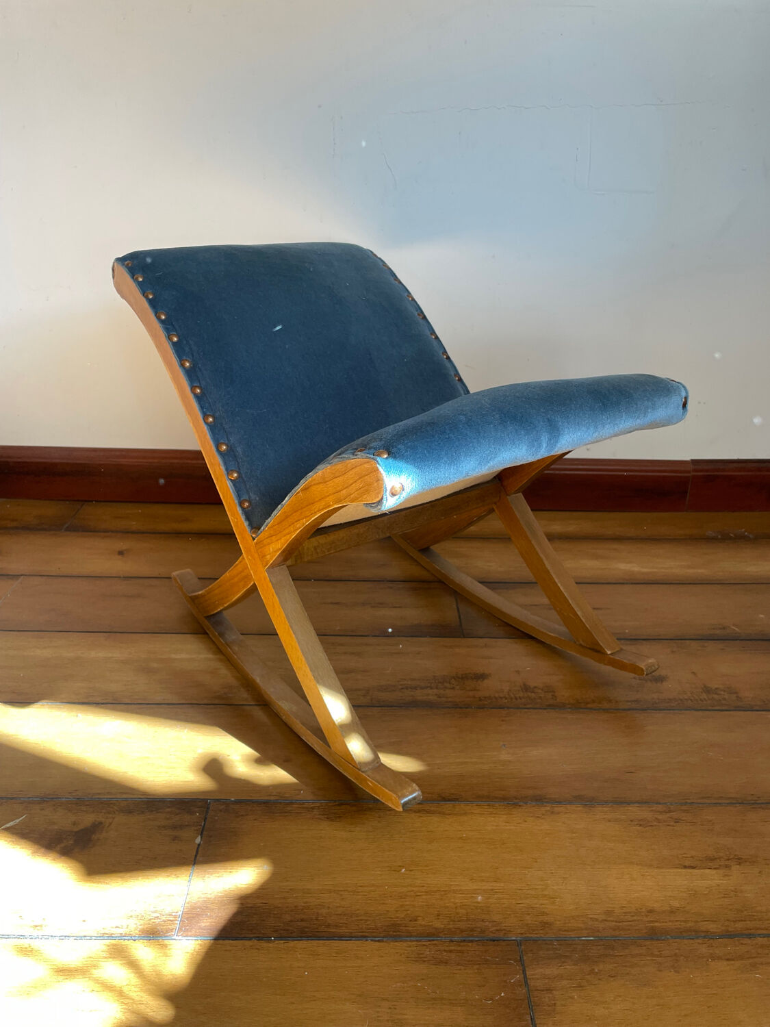 Rocking blue velvet footrest