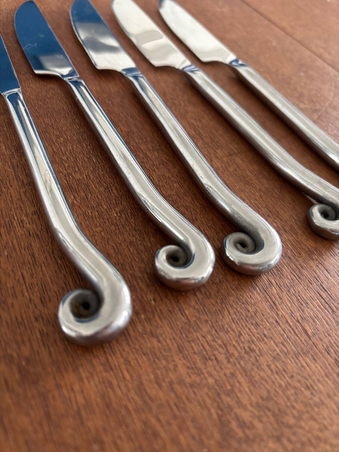Vintage 24-piece stainless steel cutlery set with spiral handles