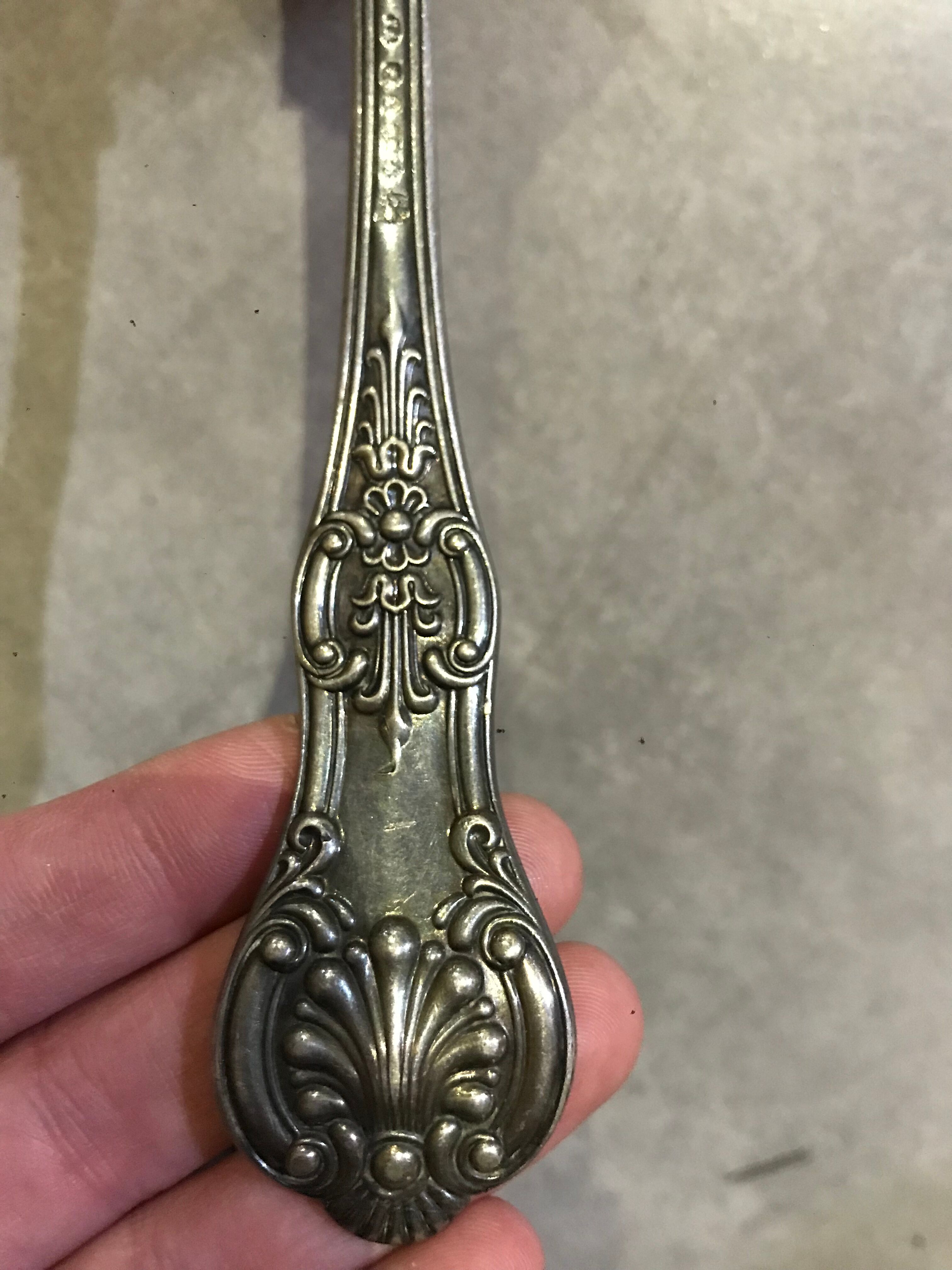 Small silver metal ladle