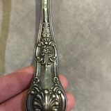 Small silver metal ladle