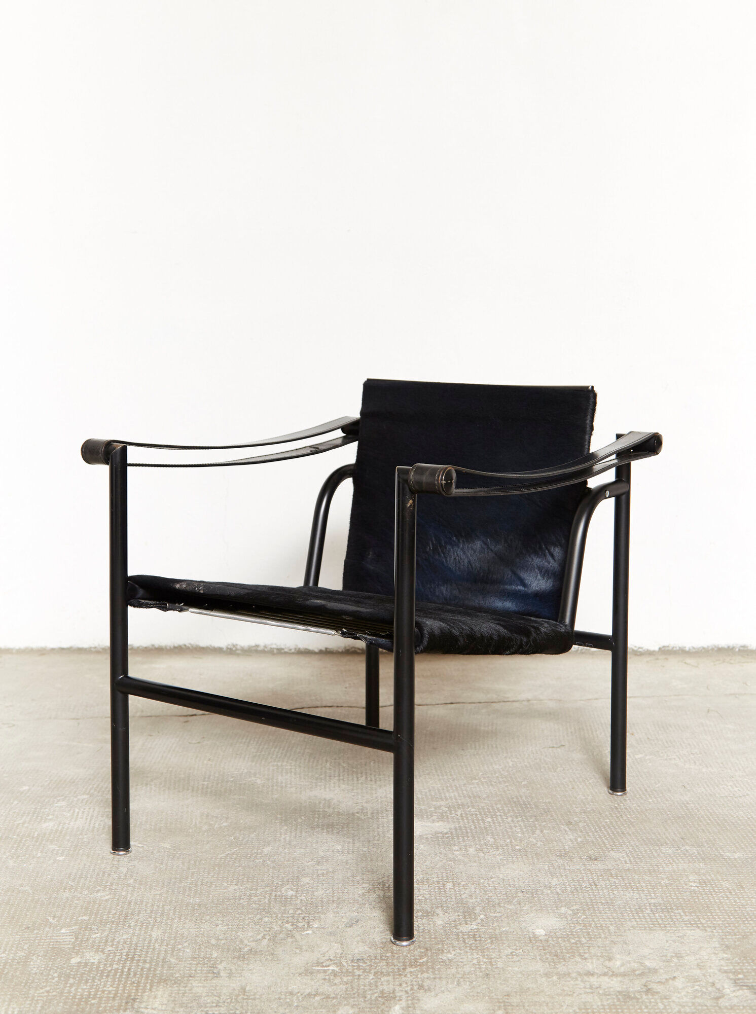 LC1 armchair by Le Corbusier, Perriand, & Jeanneret for Cassina