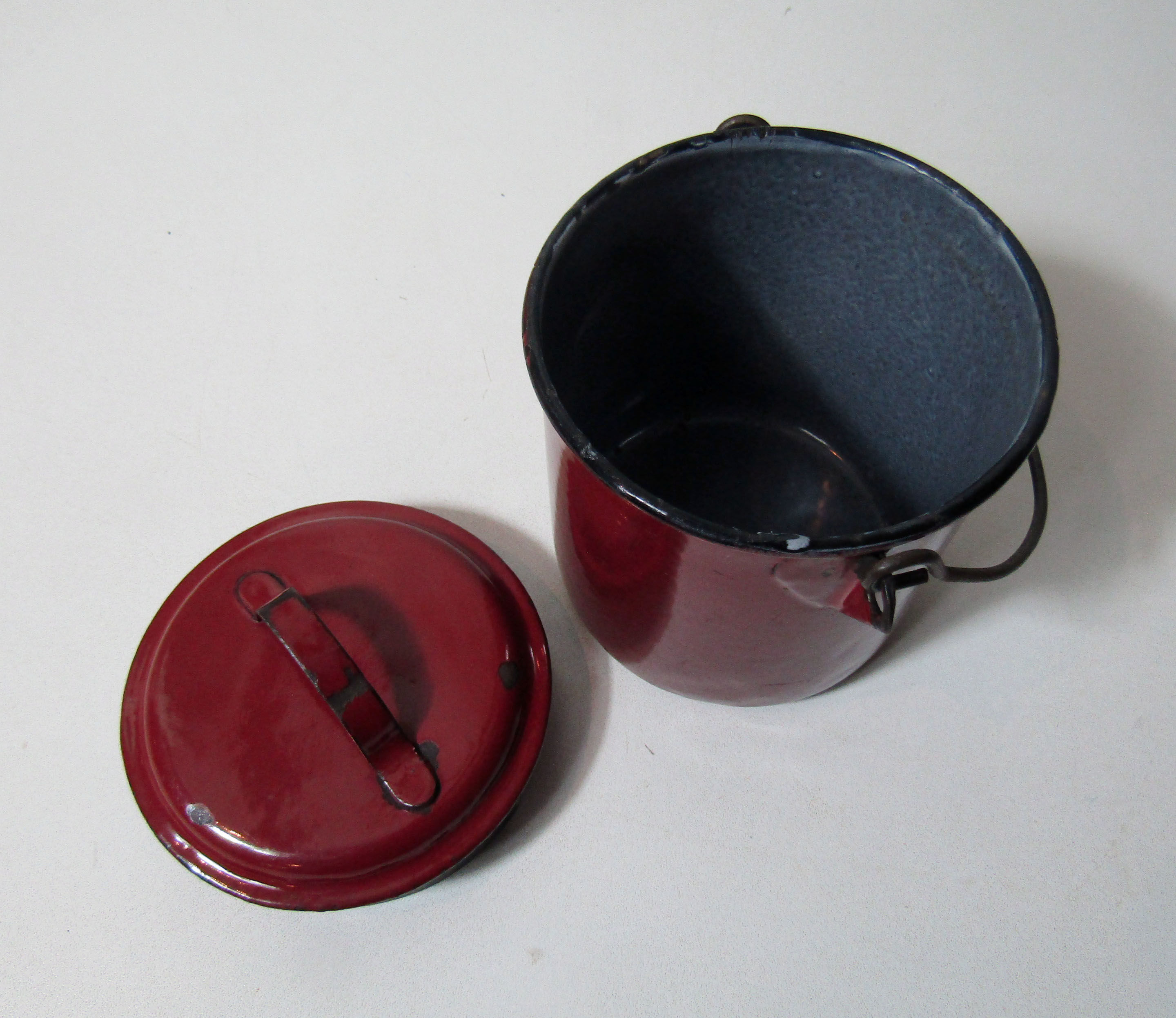 Old enamelled metal bucket pot