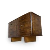 A vintage Italian chest of drawers, made of veneered walnut and solid wood,