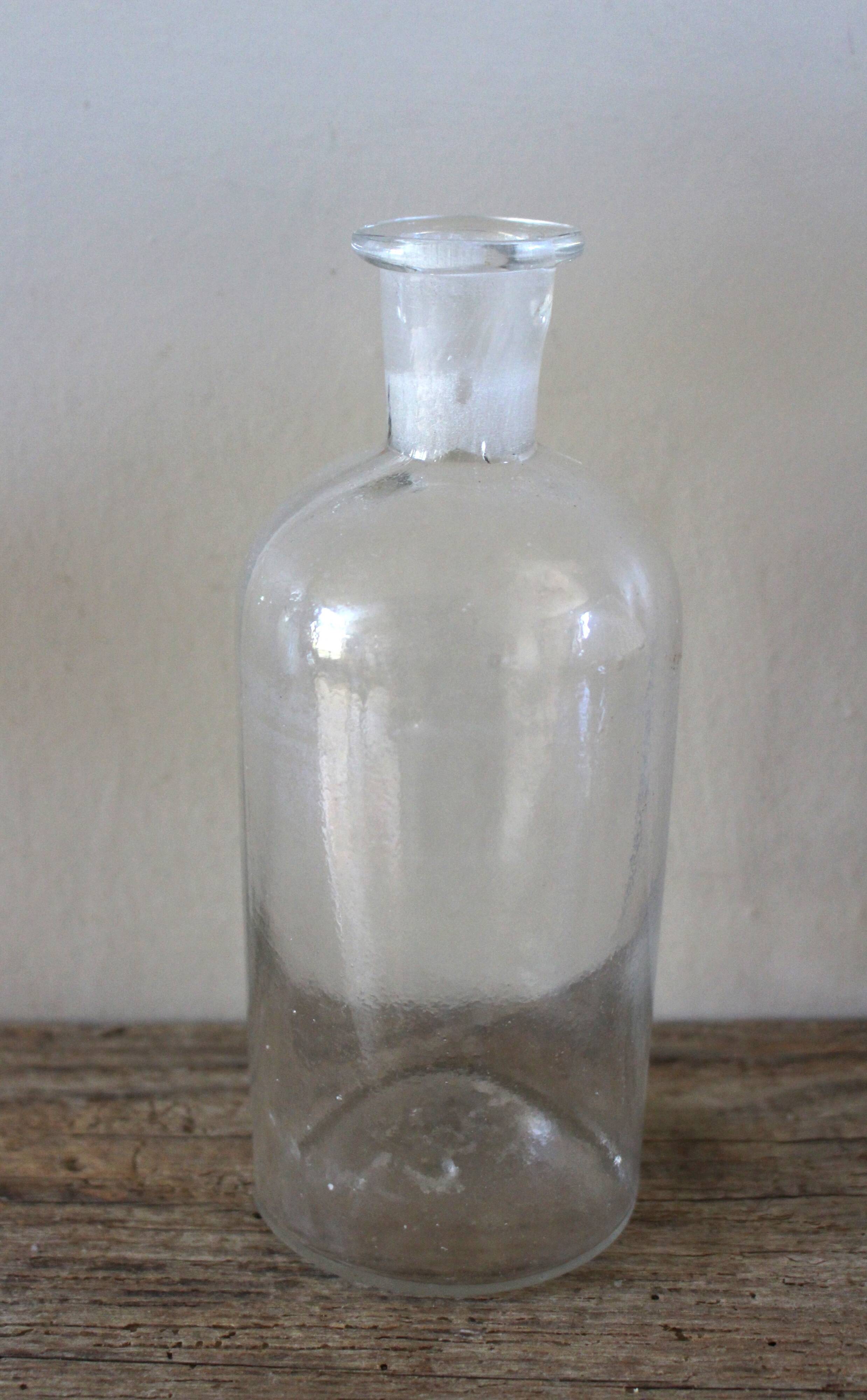 Clear glass bottle vase 500