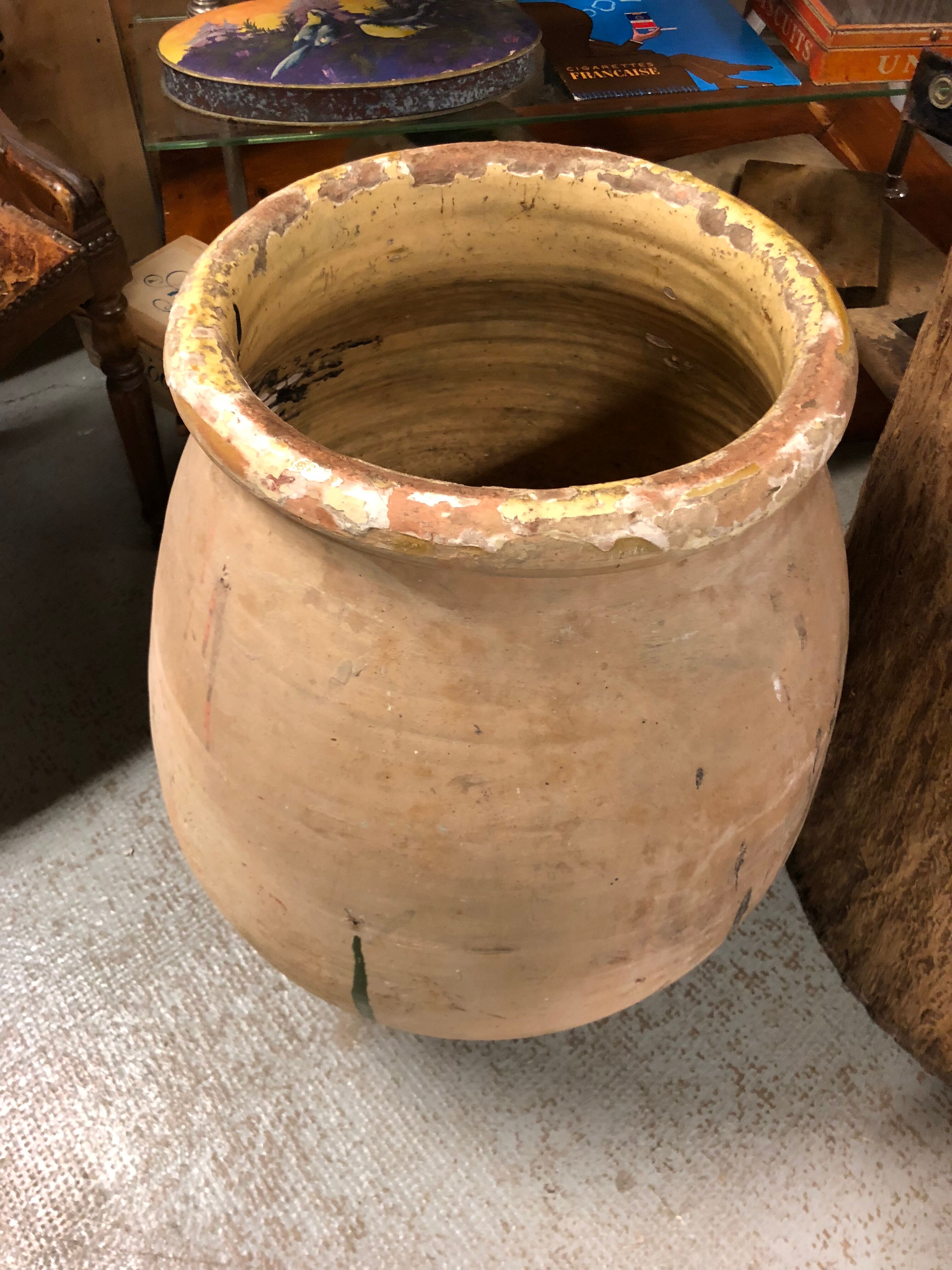 Yellow glazed terracotta garden jar