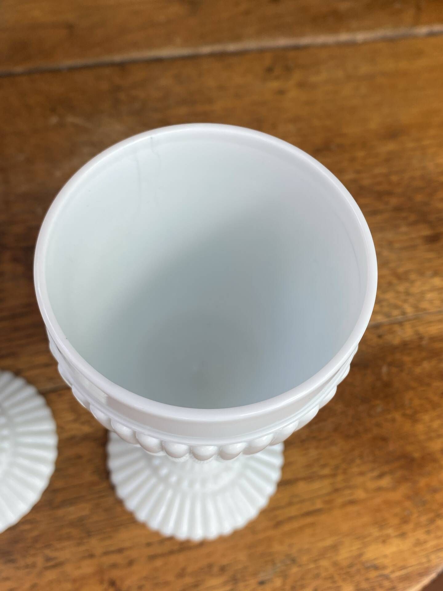 Footed glasses, white opaline chalices
