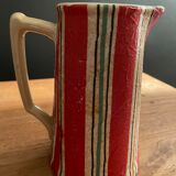 Earthenware pitcher covered with paper