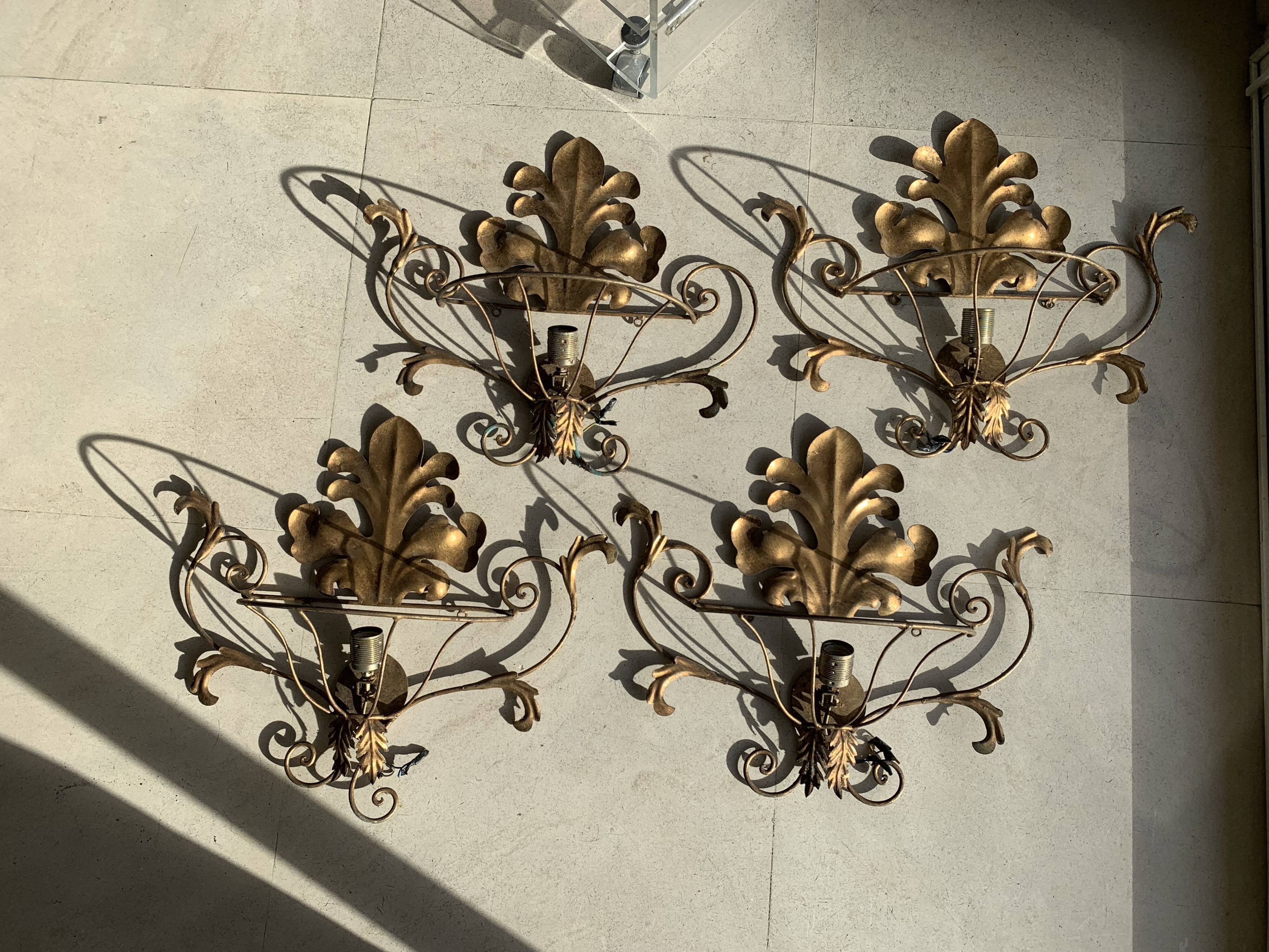 Set of gold wall lights