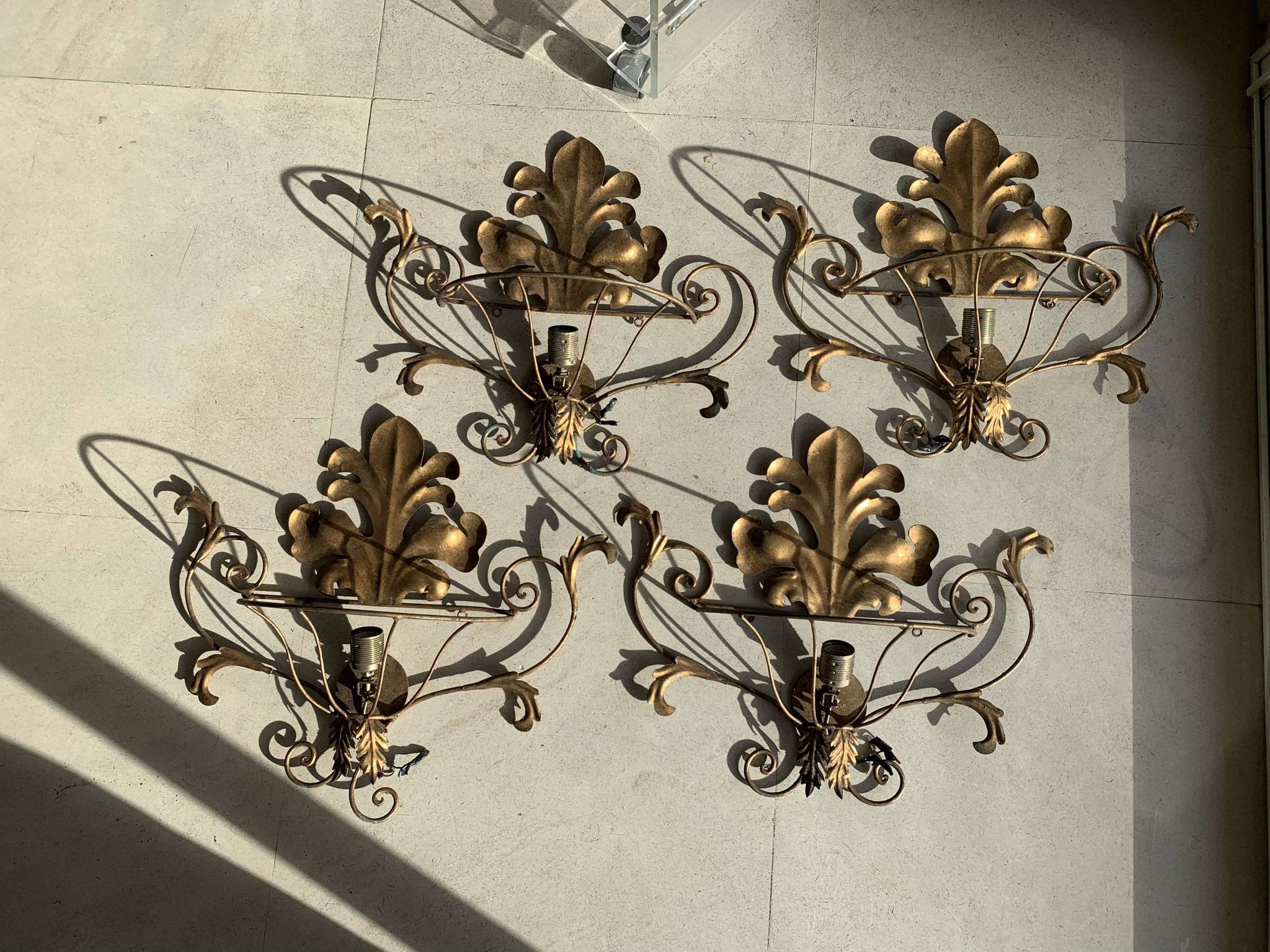 Set of gold wall lights