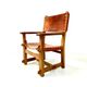 Chaise de château brutaliste ancienne faite à la main en chêne et cuir cognac, années 1920.