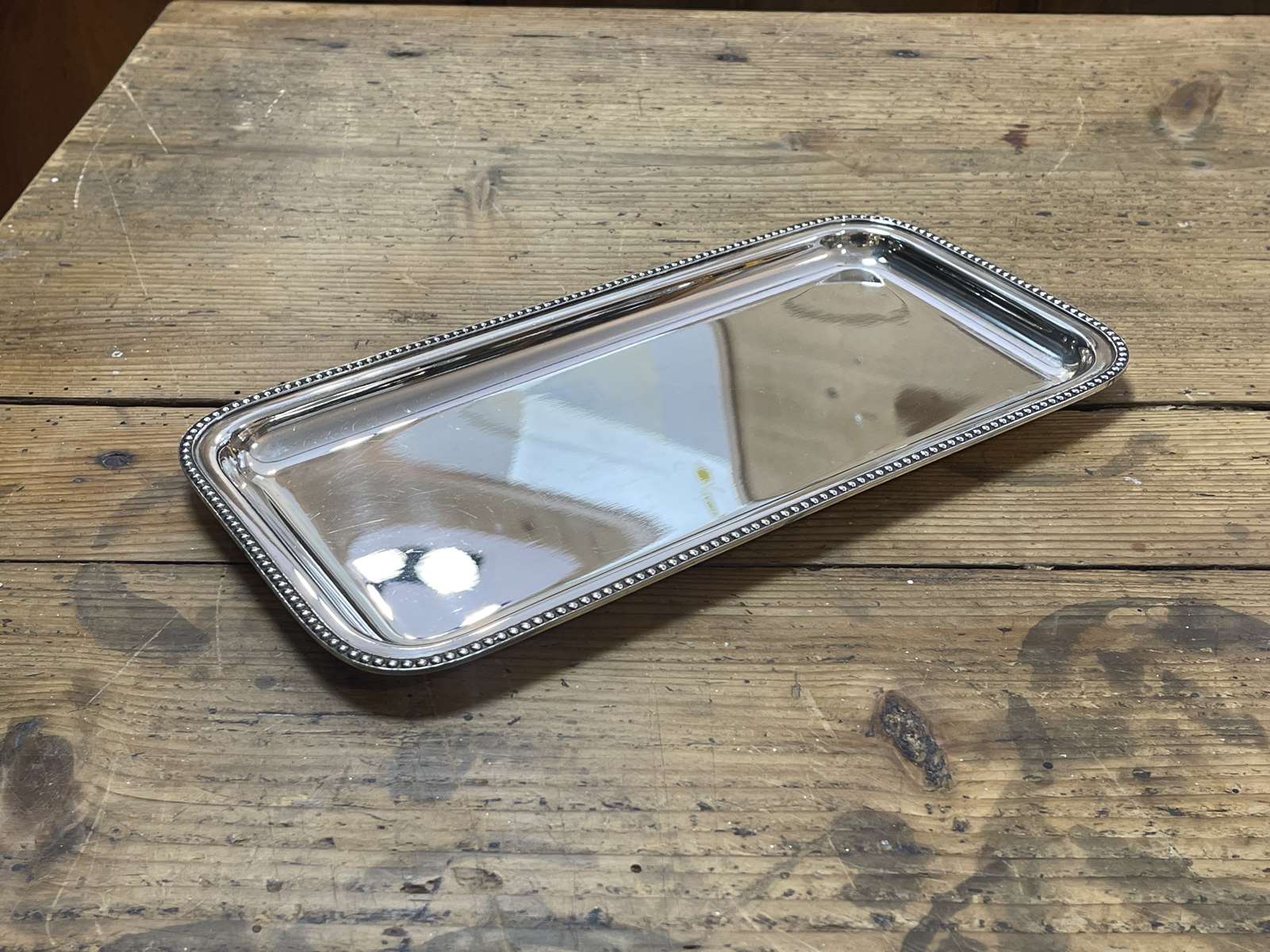 Small rectangular and beaded silver metal top