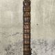 Vintage brutalist floor lamp made of turned wood.