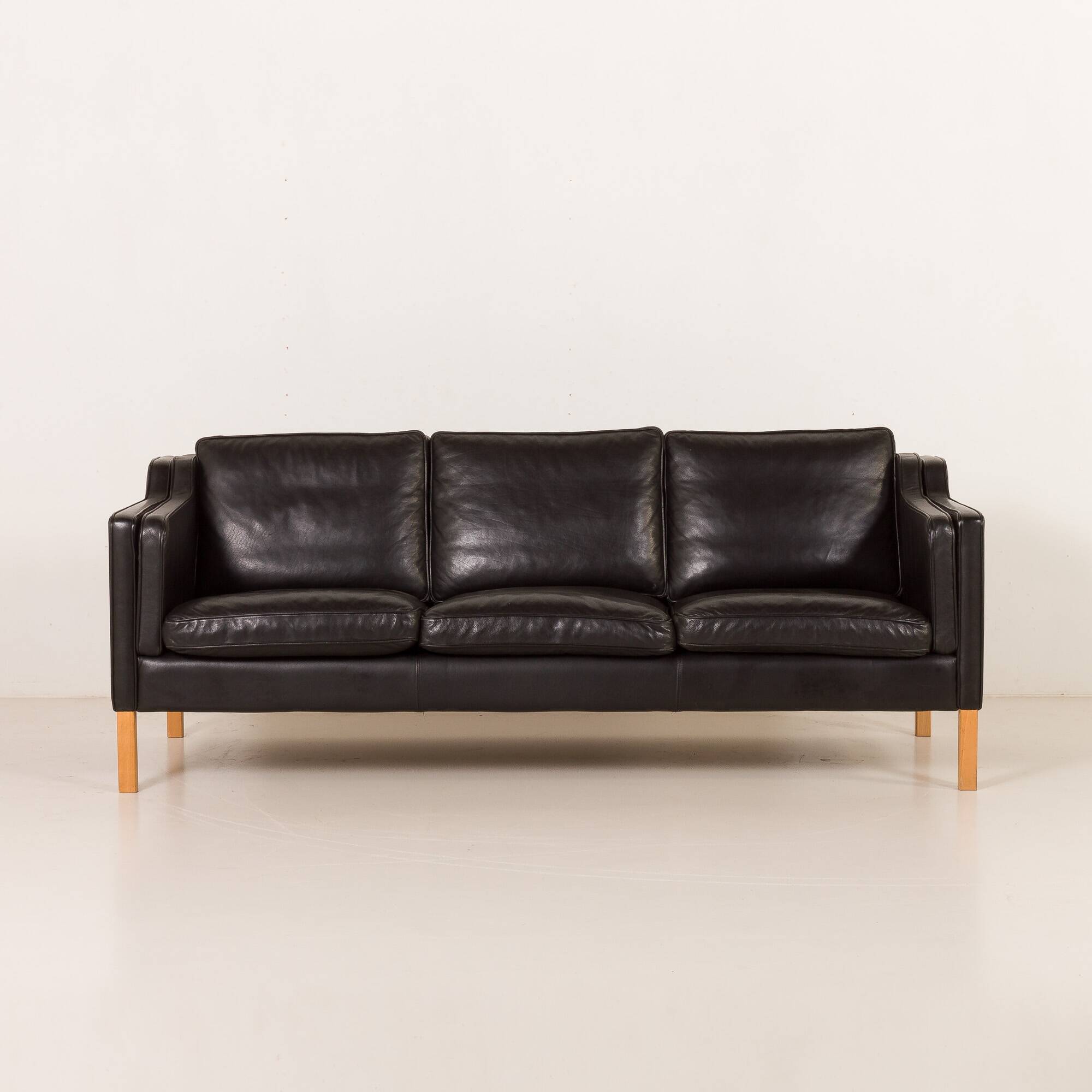 Stouby black leather sofa, Denmark 1970s