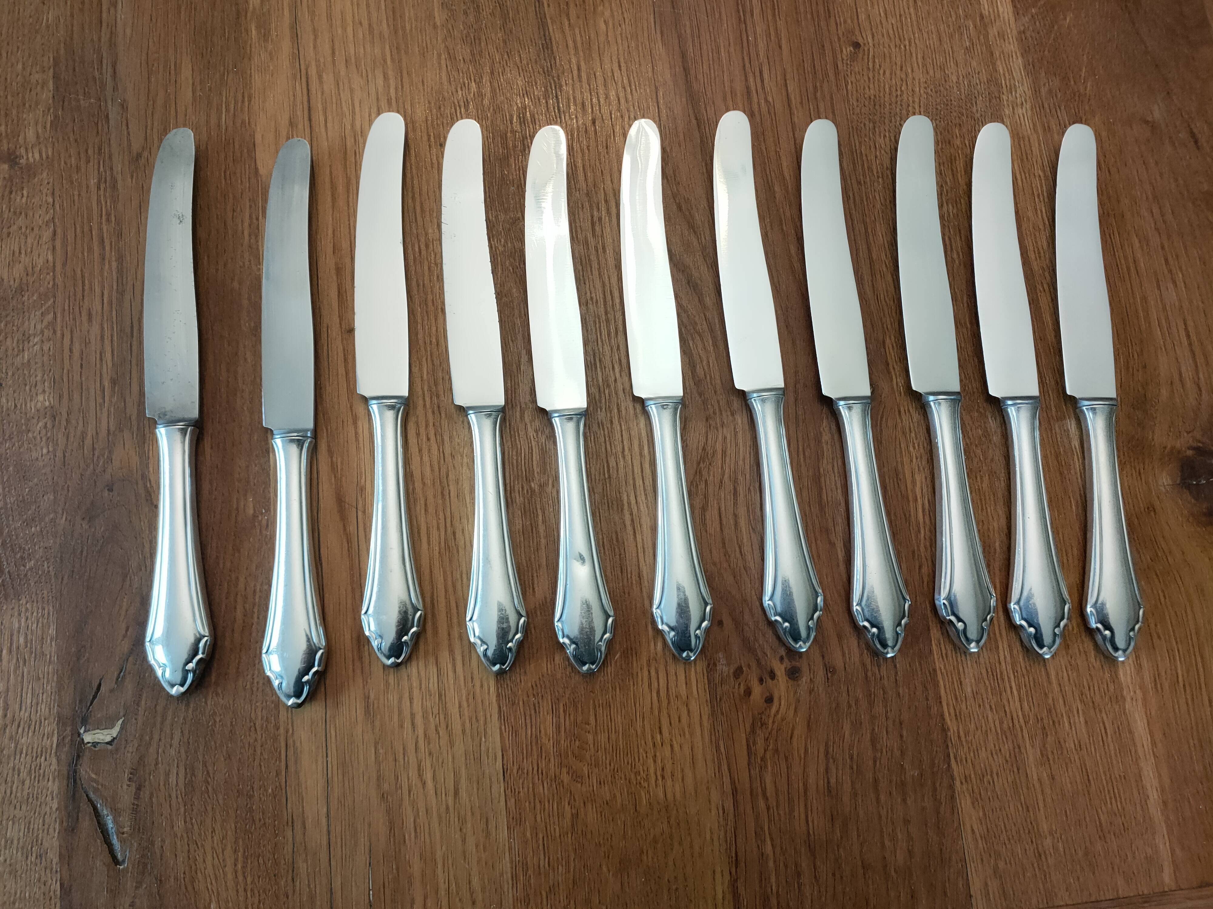 set of 11 silver metal cutlery