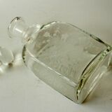 Glass decanter with cut stopper and traditional engraving, vintage from the 1960s