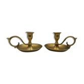 Pair of brass hand candlesticks