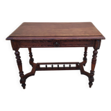 Antique desk or small table in solid carved wood