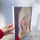 Painting of a blonde woman / oil on canvas
