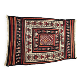 Rectangular folk rug from North Africa with a dominant red colour, 1970s.