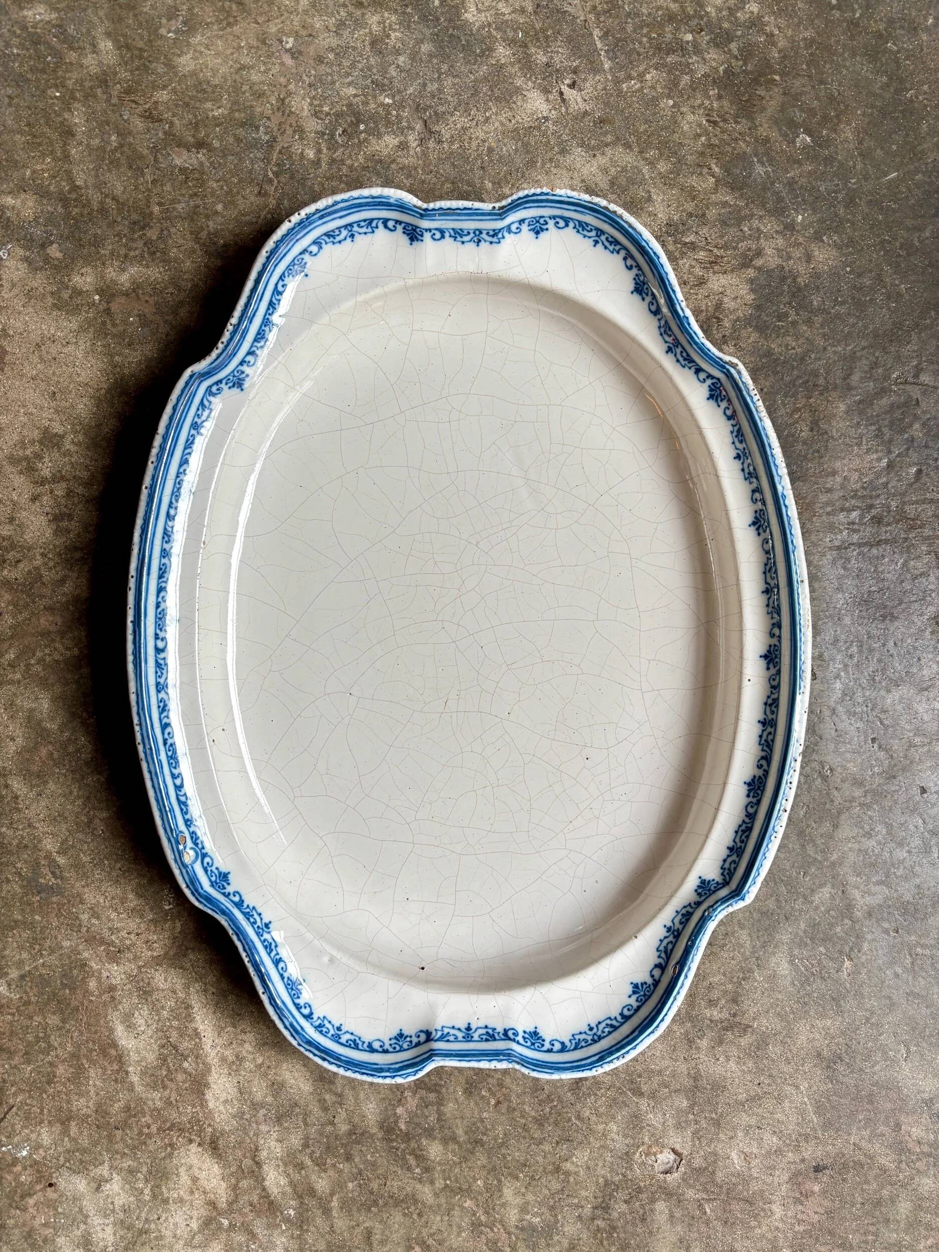 Moustiers hollow oval dish in glazed earthenware