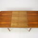 Extendable dining table designed by Jindřich Halabala for UP Závody, 1957.