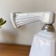 Art Deco ceramic wall sconce with swan neck and opaline glass