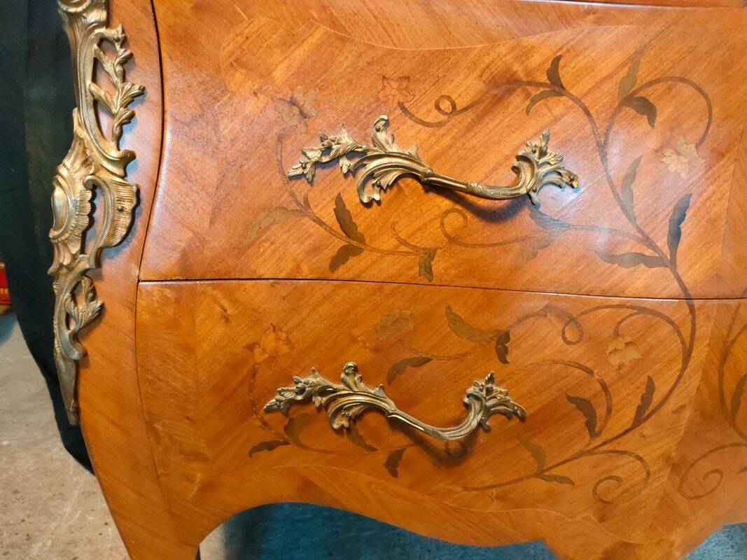 Louis XV style commode with marquetry and marble.